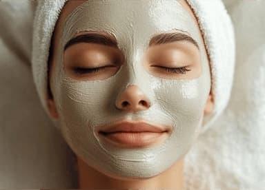 Makeup artist applying foundation on a client